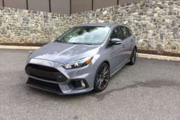 The Focus RS has a look that screams that it’s a hot hatch right from its unique and stand-out stealth gray color. There is a unique front grill that looks racy; the fog lights are placed into vents.  (WTOP/Mike Parris)