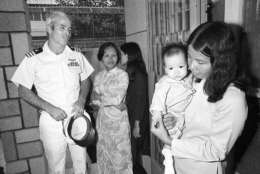 U.S. Navy Commander John S. McCain 3rd, a guest of the South Vietnamese government, visits the Holt orphanage in Saigon, Vietnam, on Oct. 30, 1974.  The institution cares for many youngsters fathered by American G.I.s.  McCain, son of the admiral who commanded U.S. forces in the Pacific at the height of the Vietnam War, was shot down over Hanoi and spent several years as a POW.  (AP Photo/Dang Van Phuoc)