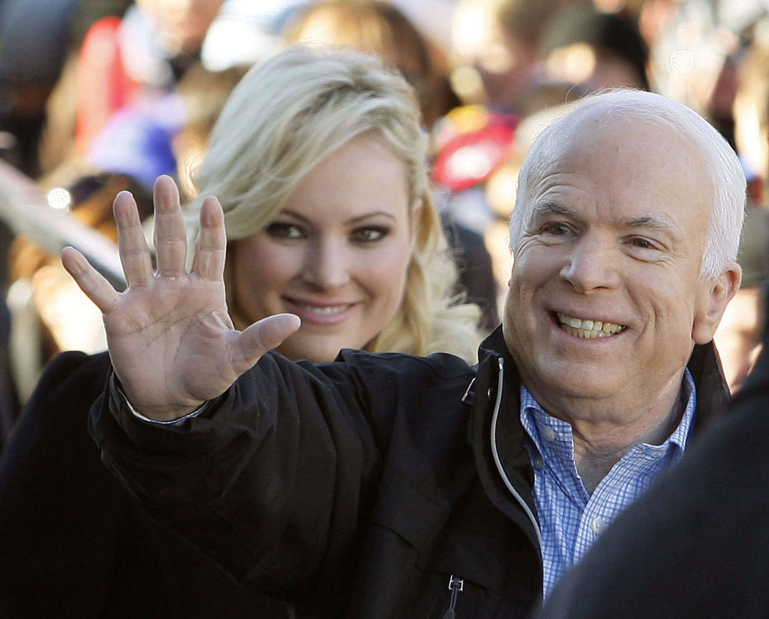 After his loss in the 2000 Republican primary, Sen. McCain ran again in 2008 and this time won the Republican nomination. In this photo McCain accompanied by his daughter Meghan McCain, waves to supporters as he enters a campaign rally at Defiance Junior High School in Defiance, Ohio., Thursday, Oct. 30, 2008. (AP Photo/Stephan Savoia)