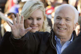 After his loss in the 2000 Republican primary, Sen. McCain ran again in 2008 and this time won the Republican nomination. In this photo McCain accompanied by his daughter Meghan McCain, waves to supporters as he enters a campaign rally at Defiance Junior High School in Defiance, Ohio., Thursday, Oct. 30, 2008. (AP Photo/Stephan Savoia)