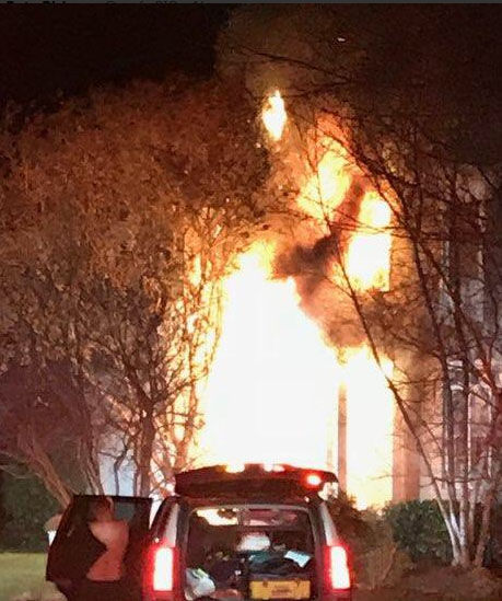Montgomery County firefighters battle a fire in a two-story house on Larkmeade Lane in Potomac, Maryland, Saturday, Dec. 30, 2017.(Courtesy Montgomery County Fire & Rescue)