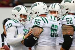 HADLEY, MA - SEPTEMBER 30:  Nathan Rourke #12 of the Ohio Bobcats celebrates with Joe Lowery #65 after scoring a touchdown during the second quarter against the Massachusetts Minutemen at Warren McGuirk Alumni Stadium on September 30, 2017 in Hadley, Massachusetts.  (Photo by Tim Bradbury/Getty Images)
