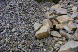 Close-up of different sized piles of rocks