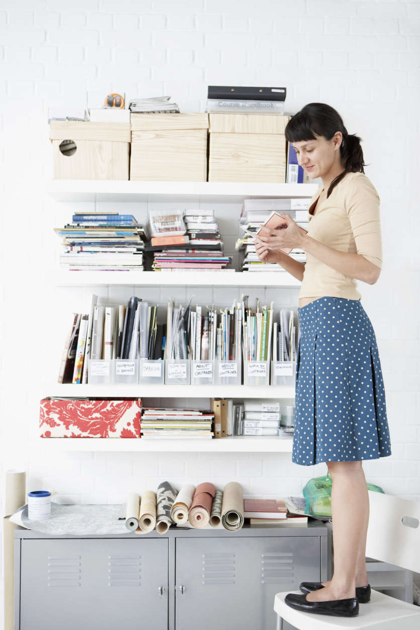 Woman by Shelves