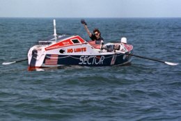 Tori Murden, of Louisville, Ky., attempting to become the first American and first woman to row solo across the North Atlantic Ocean, waves her hat as she hits open water Sunday, June 14, 1998, off North Carolina's Outer Banks, near Nags Head, N.C. Murden hopes to row 3, 635 miles as the crow flies and make the French coast in mid-September. (AP Photo/Bob Jordan)