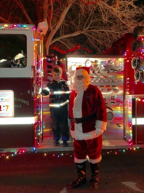 Wolff's son met with Santa on Tuesday, played by a member of the Laytonsville Fire Department. (photo courtesy of Wolff's Family)