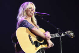 Artist Deana Carter performs "Strawberry Wine" at the Nashville Songwriters Association International "50 Years of Songs" at the Ryman Auditorium on Wednesday, Sept. 20, 2017 in Nashville, Tenn. (Photo by Laura Roberts/Invision/AP)