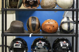 Helmets to be used for testing football helmet to helmet collisions sit in a rack at a laboratory in the Cleveland Clinic's Lutheran Hospital in Cleveland Thursday, Sept. 23, 2010. Under the direction of Spine Research Laboratory director Lars Gilbertson, the Clinic will soon begin testing to research concussions and other sports-related head and neck injuries. (AP Photo/Mark Duncan)