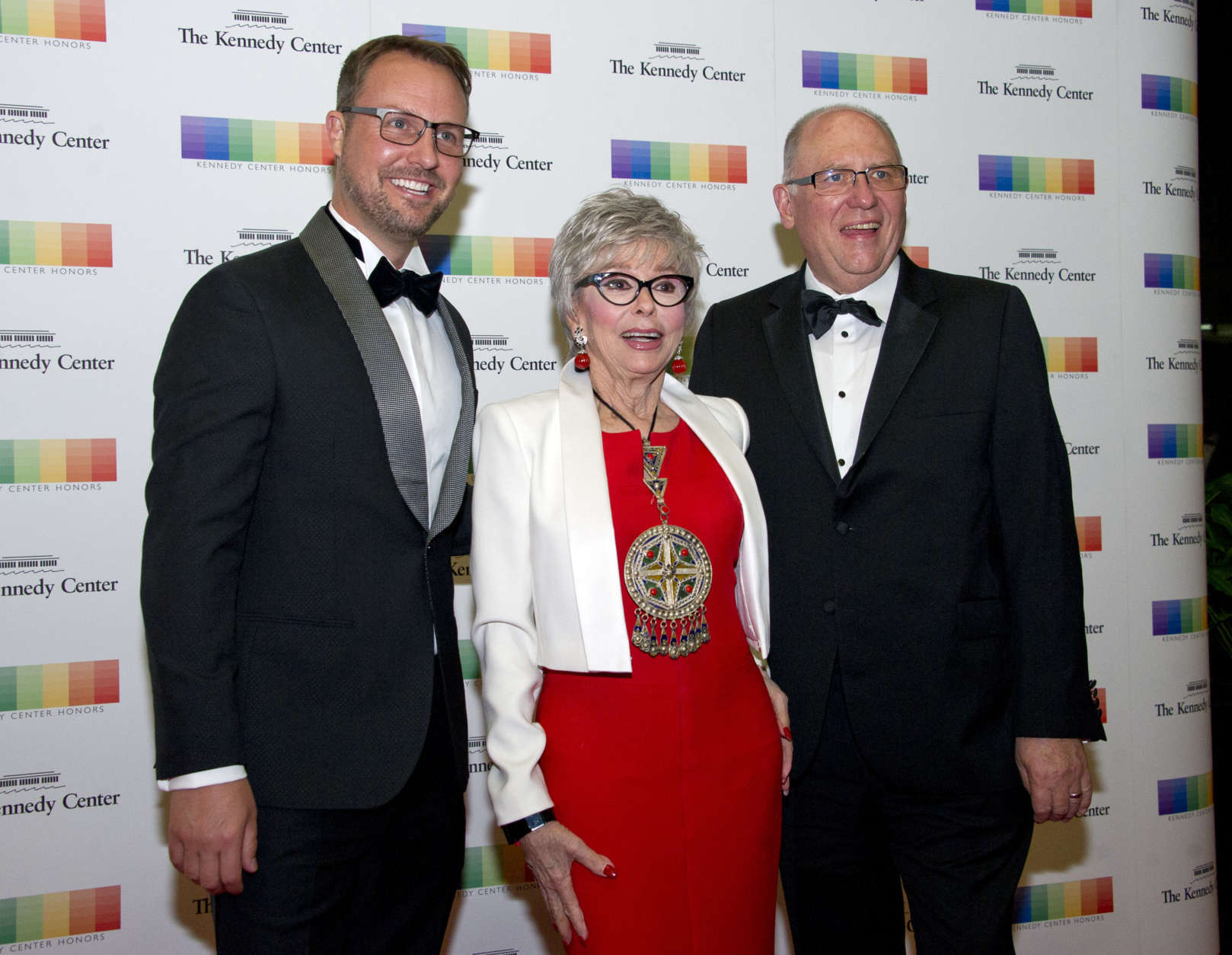 WASHINGTON, DC - DECEMBER 02: From left, Producer Brent Miller, 2015 Kennedy Center Honoree Rita Moreno, and manager John Ferguson arrive for the formal Artist's Dinner hosted by United States Secretary of State Rex Tillerson in their honor at the US Department of State on December 2, 2017 in Washington, D.C.   From left to right back row: LL Cool J and Lionel Richie  Front row, left to right: Carmen de Lavallade, Norman Lear and Gloria Estefan.  The 2017 honorees are: American dancer and choreographer Carmen de Lavallade; Cuban American singer-songwriter and actress Gloria Estefan; American hip hop artist and entertainment icon LL COOL J; American television writer and producer Norman Lear; and American musician and record producer Lionel Richie. (Photo by Ron Sachs - Pool/Getty Images)