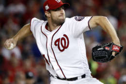 Washington Nationals relief pitcher Max Scherzer (31) throws during the fifth inning in Game 5 of baseball's National League Division Series against the Chicago Cubs, at Nationals Park, Thursday, Oct. 12, 2017, in Washington. (AP Photo/Pablo Martinez Monsivais)