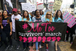 Participants march against sexual assault and harassment at the #MeToo March in the Hollywood section of Los Angeles on Sunday, Nov. 12, 2017.  (AP Photo/Damian Dovarganes)