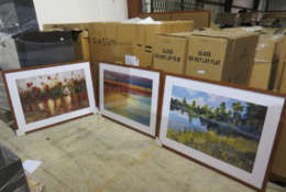 Boxes of random "waiting-room-style" art. Get decorating! (GSAAuctions.gov)