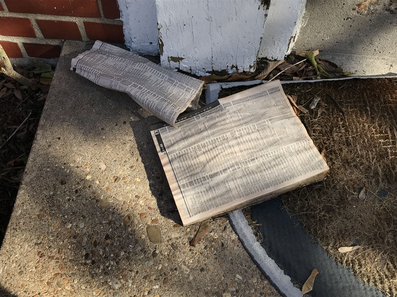 The substation is still fooling people 60 years after it was built. When we visited, we found a phone book had been left on the doormat. (WTOP/Michelle Basch)