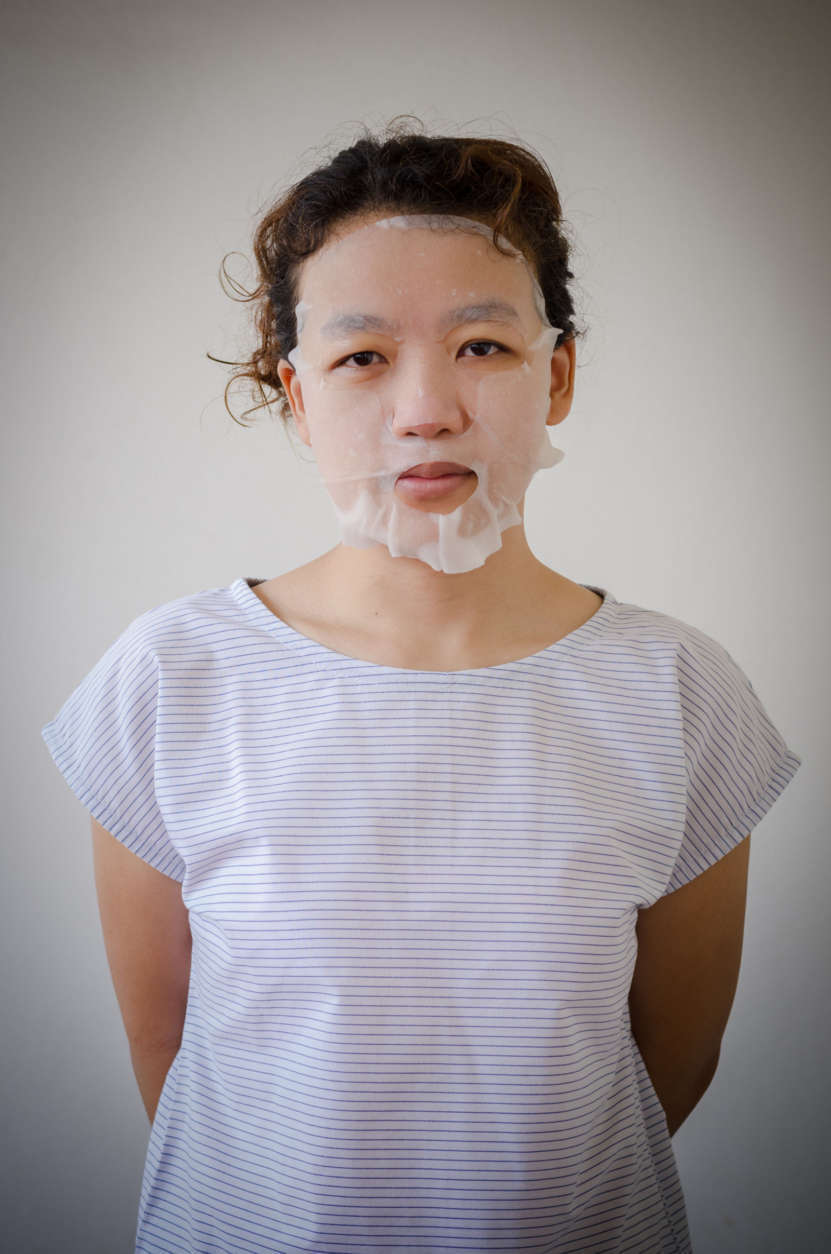 Asia girl portrait with a mask sheet