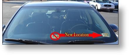 Picture shows a car windshield. Virginia inspection stickers will be in the lower left corner.