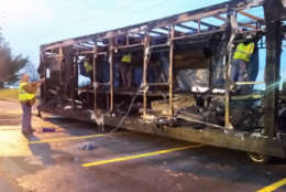 A package loading work trailer is destroyed after Monday's fire. (WTOP/Kathy Stewart)