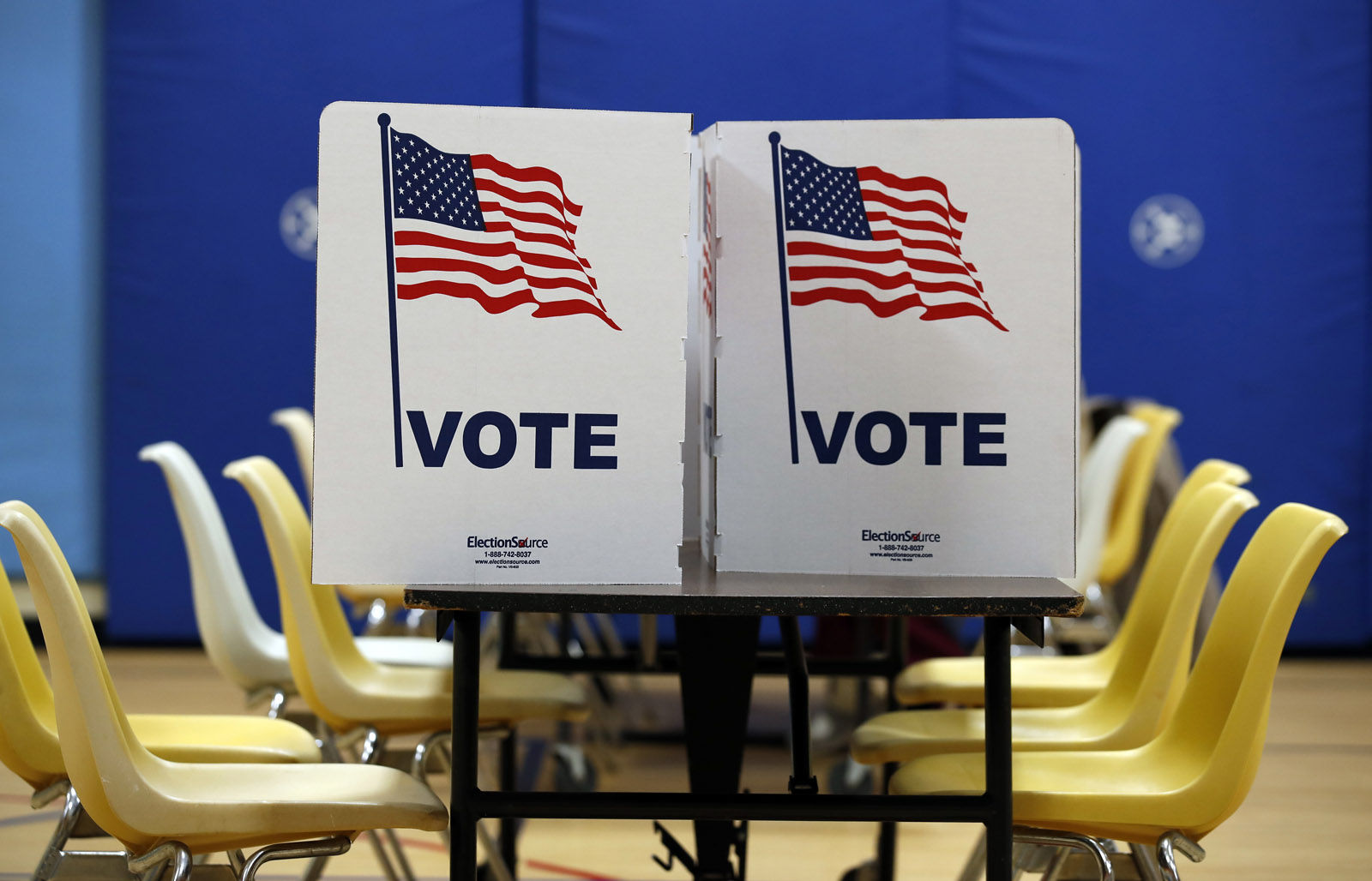 Empty chairs are seen at a polling place Tuesday, Nov. 7, 2017, in Alexandria, Va. (AP Photo/Alex Brandon)