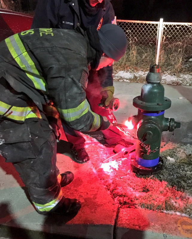 Firefighters responded to calls of a fire in Southeast D.C. around 3 a.m. Thursday. (Ice coats a firetruck Thursday morning. (Courtesy D.C. Fire and EMS)