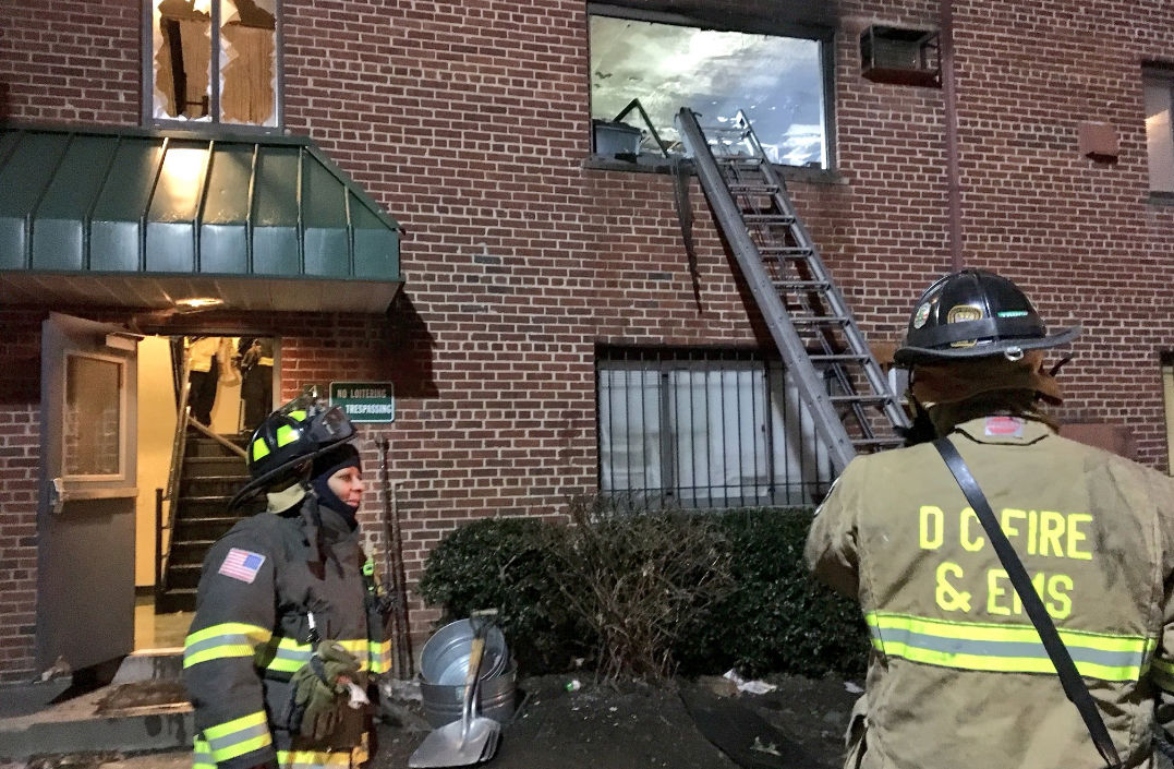 D.C. firefighters rescued a man from the second floor of a Southeast apartment Thursday morning. (Courtesy D.C. Fire and EMS)