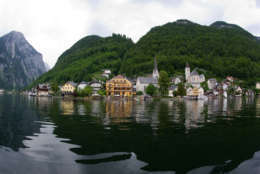 This photo taken on Thursday, June 16, 2011, shows the Upper Austrian town of Hallstadt. After taking photos and collecting other data on the village while mingling with the tourists, Chinese architects plan to rebuild Hallstatt in all topsy-turvy glory in far-away  Guandong province _ a project that residents here see with mixed emotions. (AP Photo/Kerstin Joensson)