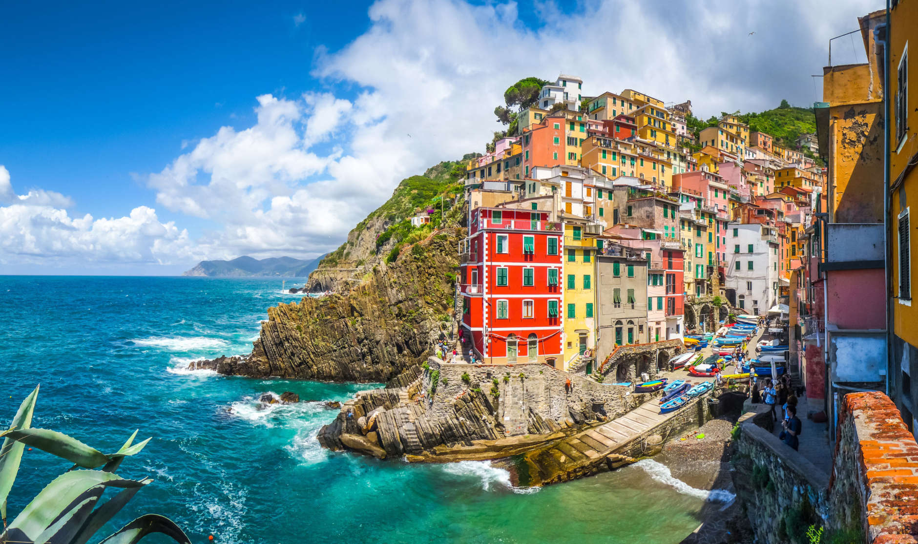 Panoramic view of Riomaggiore, one of the five famous fisherman villages of Cinque Terre in Liguria, Italy