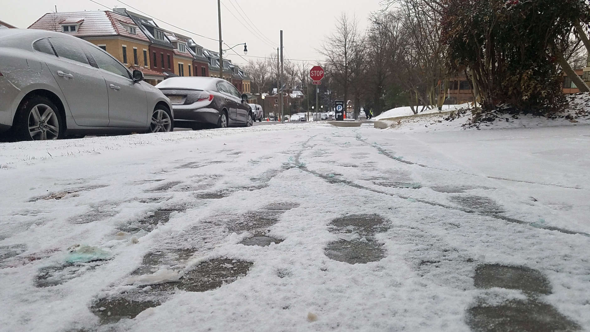 Footprints in the light snow that fell in Northwest D.C. Jan. 17. (WTOP/William Vitka)