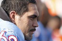 FILE - This Nov. 15, 2009, file photo shows Tennessee Titans center Kevin Mawae on the sideline during the second quarter of an NFL football game against the Buffalo Bills,  in Nashville, Tenn. An official with knowledge of the announcement says Kevin Mawae, president of the NFL Players Association, is retiring from the NFL after 16 seasons and eight Pro Bowls.  (AP Photo/Wade Payne, File)
