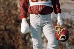 Washington Redskins offensive tackle Joe Jacoby takes a break during practice at Redskin Park in Chantilly, Va., Jan. 8, 1987. Jacoby will take his broken hand into action against the New York Giants and his counterpart Lawrence Taylor in East Rutherford, N.J. The game will determine the NFC champion. (AP Photo/J. Scott Applewhite)