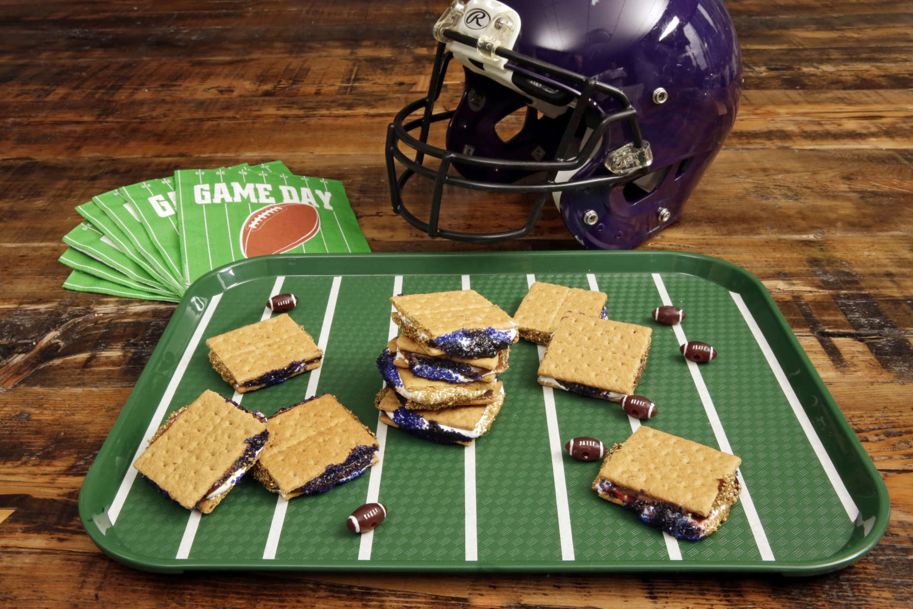 In this Dec. 8, 2016 photo at the Institute of Culinary Education in New York, Game Day S'mores are shown, from a recipe by Elizabeth Karmel. These sweet treats are a riff on the very popular summer campfire s'mores. If you love marshmallow and chocolate, and have fun nostalgic memories of campfire s'mores, these simpler "no-bake" Game Day S'mores will delight you. (AP Photo/Richard Drew)