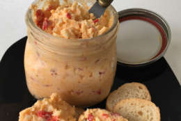 This 2017 photo shows Classic Pimento Cheese from a recipe by Elizabeth Karmel, in Houston, Texas. This comfort food is basically only thre e simple ingredients, sharp cheddar cheese, jarred pimentos and mayonnaise - but when you combine them, you get a creamy, sharp, piquant spread that is so versatile you can use it for just about any meal part. (Elizabeth Karmel via AP)