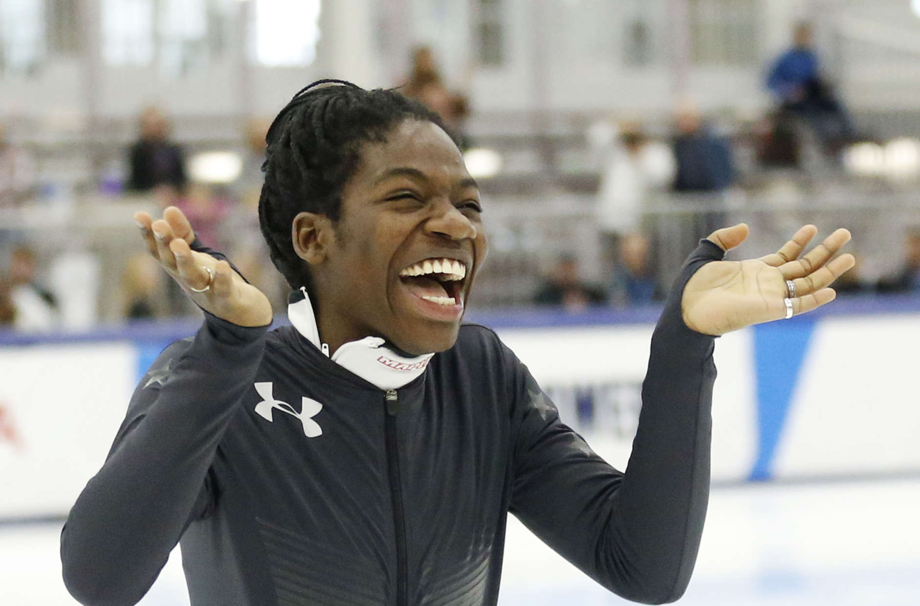 Maame Biney reacts during a medal ceremony after winning women's 500-meter A final race during the U.S. Olympic short track speedskating trials Saturday, Dec. 16, 2017, in Kearns, Utah. (AP Photo/Rick Bowmer)