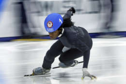 Maame Biney (1) competes in the women's 500-meter during the U.S. Olympic short track speedskating trials Saturday, Dec. 16, 2017, in Kearns, Utah. (AP Photo/Rick Bowmer)