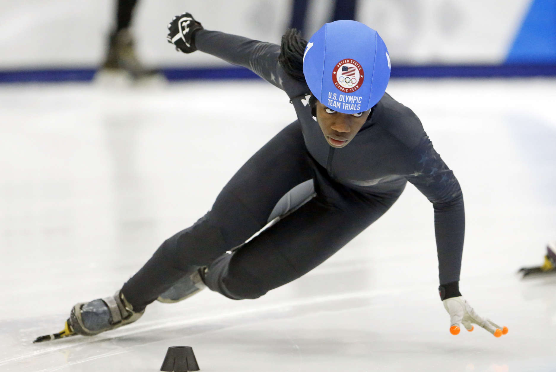 Maame Biney (1) competes in the women's 1000-meter during the U.S.Olympic short track speedskating trials Sunday, Dec. 17, 2017, in Kearns, Utah. (AP Photo/Rick Bowmer)