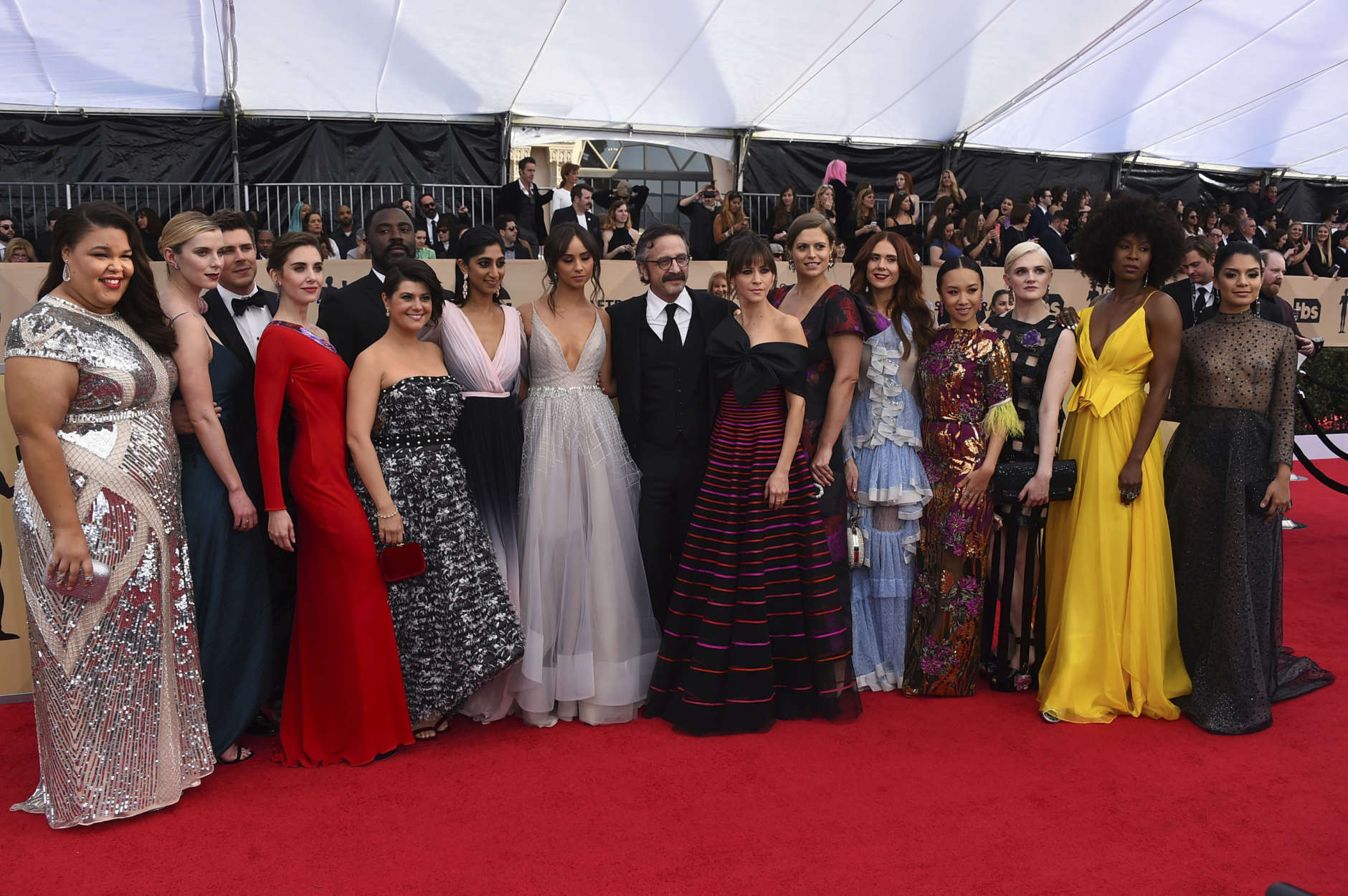 The cast of "Glow" arrives at the 24th annual Screen Actors Guild Awards at the Shrine Auditorium &amp; Expo Hall on Sunday, Jan. 21, 2018, in Los Angeles. (Photo by Jordan Strauss/Invision/AP)