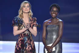 Brie Larson, left, and Lupita Nyong'o present the award for outstanding performance by a cast in a motion picture at the 24th annual Screen Actors Guild Awards at the Shrine Auditorium &amp; Expo Hall on Sunday, Jan. 21, 2018, in Los Angeles. (Photo by Vince Bucci/Invision/AP)