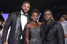 Winston Duke, from left, Lupita Nyong'o and Daniel Kaluuya pose in the audience at the 24th annual Screen Actors Guild Awards at the Shrine Auditorium &amp; Expo Hall on Sunday, Jan. 21, 2018, in Los Angeles. (Photo by Vince Bucci/Invision/AP)