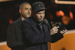 Residente accepts the best Latin rock, urban or alternative album for "Residente" at the 60th annual Grammy Awards at Madison Square Garden on Sunday, Jan. 28, 2018, in New York. (Photo by Matt Sayles/Invision/AP)