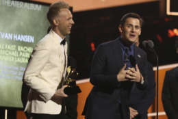 Benj Pasek, right, and Justin Paul accept the best musical theater album award for "Dear Evan Hansen" at the 60th annual Grammy Awards at Madison Square Garden on Sunday, Jan. 28, 2018, in New York. (Photo by Matt Sayles/Invision/AP)