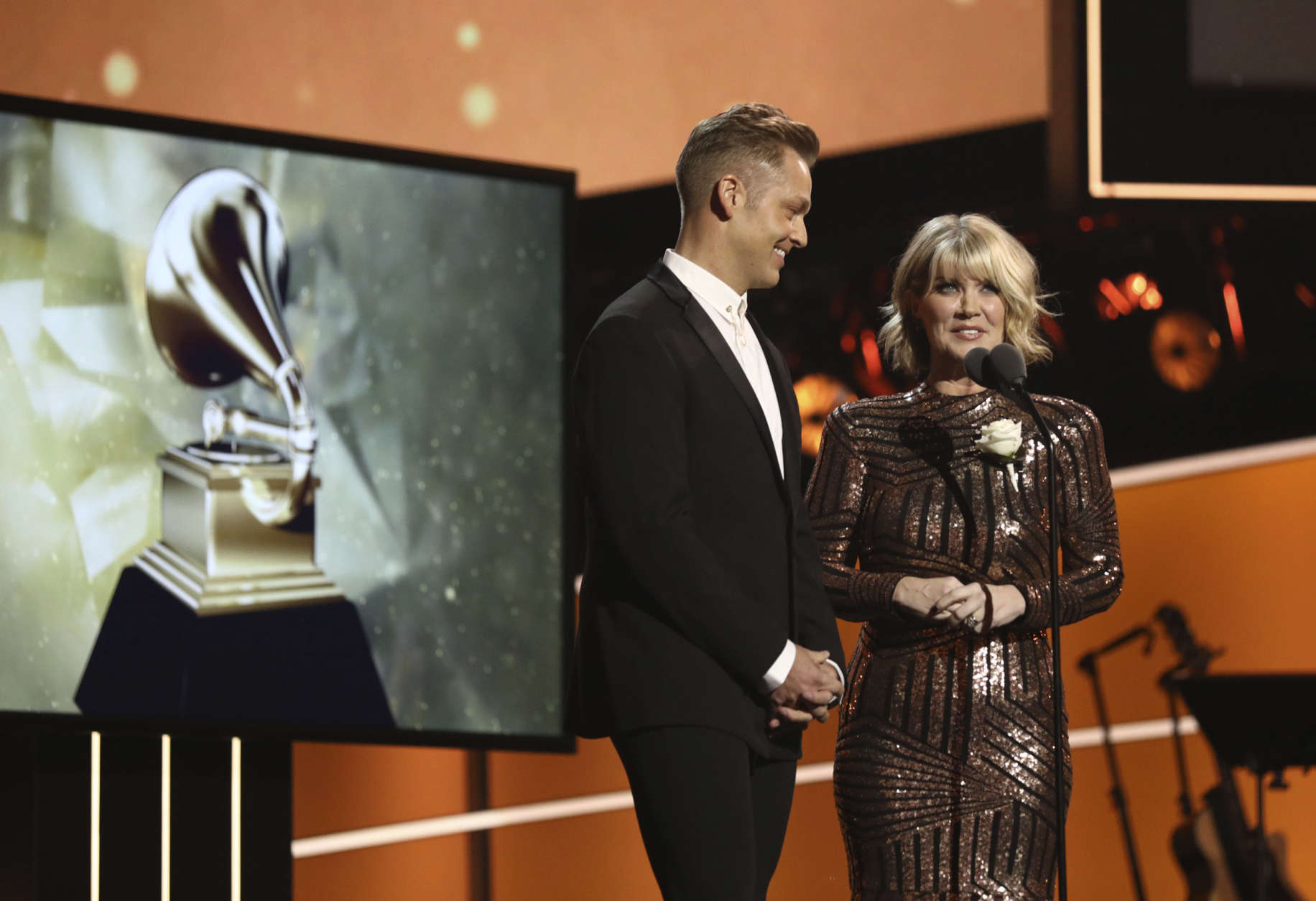 Bernie Herms, left, and Natalie Grant speak at the 60th annual Grammy Awards at Madison Square Garden on Sunday, Jan. 28, 2018, in New York. (Photo by Matt Sayles/Invision/AP)