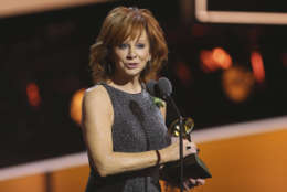 Reba McEntire accepts the award for best roots gospel album for "Sing It Now: Songs of Faith &amp; Hope" at the 60th annual Grammy Awards at Madison Square Garden on Sunday, Jan. 28, 2018, in New York. (Photo by Matt Sayles/Invision/AP)