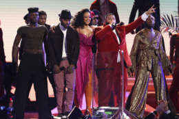Bryson Tiller, from second left, Rihanna, and DJ Khaled perform "Wild Thoughts" at the 60th annual Grammy Awards at Madison Square Garden on Sunday, Jan. 28, 2018, in New York. (Photo by Matt Sayles/Invision/AP)
