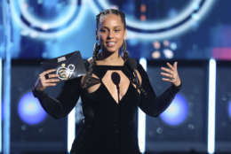 Alicia Keys presents the award for record of the year at the 60th annual Grammy Awards at Madison Square Garden on Sunday, Jan. 28, 2018, in New York. (Photo by Matt Sayles/Invision/AP)