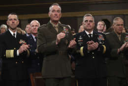 Chief of Naval Operations Adm. John Richardson, from left, Chairman of the Joint Chiefs of Staff Gen. Joseph Dunford, Chief of Staff of the Army Gen. Mark Milley, and Commandant of the Marine Corps Gen. Robert Neller listen as President Donald Trump delivers his first State of the Union address in the House chamber of the U.S. Capitol to a joint session of Congress Tuesday, Jan. 30, 2018 in Washington. (Win McNamee/Pool via AP)