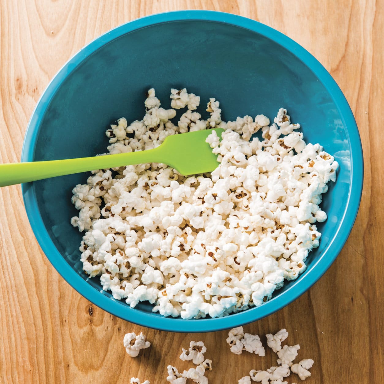 This undated photo provided by America's Test Kitchen in January 2019 shows Real Buttered Popcorn in Brookline, Mass. This recipe appears in the cookbook "Complete Cookbook for Young Chefs." (Joe Keller/America's Test Kitchen via AP)