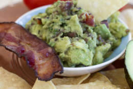 This Dec. 15, 2014 photo shows maple bacon guacamole in Concord, N.H. There are multiple ways to serve up guacamole for the Super Bowl. (AP Photo/Matthew Mead)