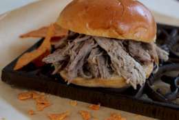 This Jan. 25, 2016 photo shows 6-ingredient slow cooker pulled pork in Concord, N.H. This dish is from a recipe by Katie Workman. (AP Photo/Matthew Mead)