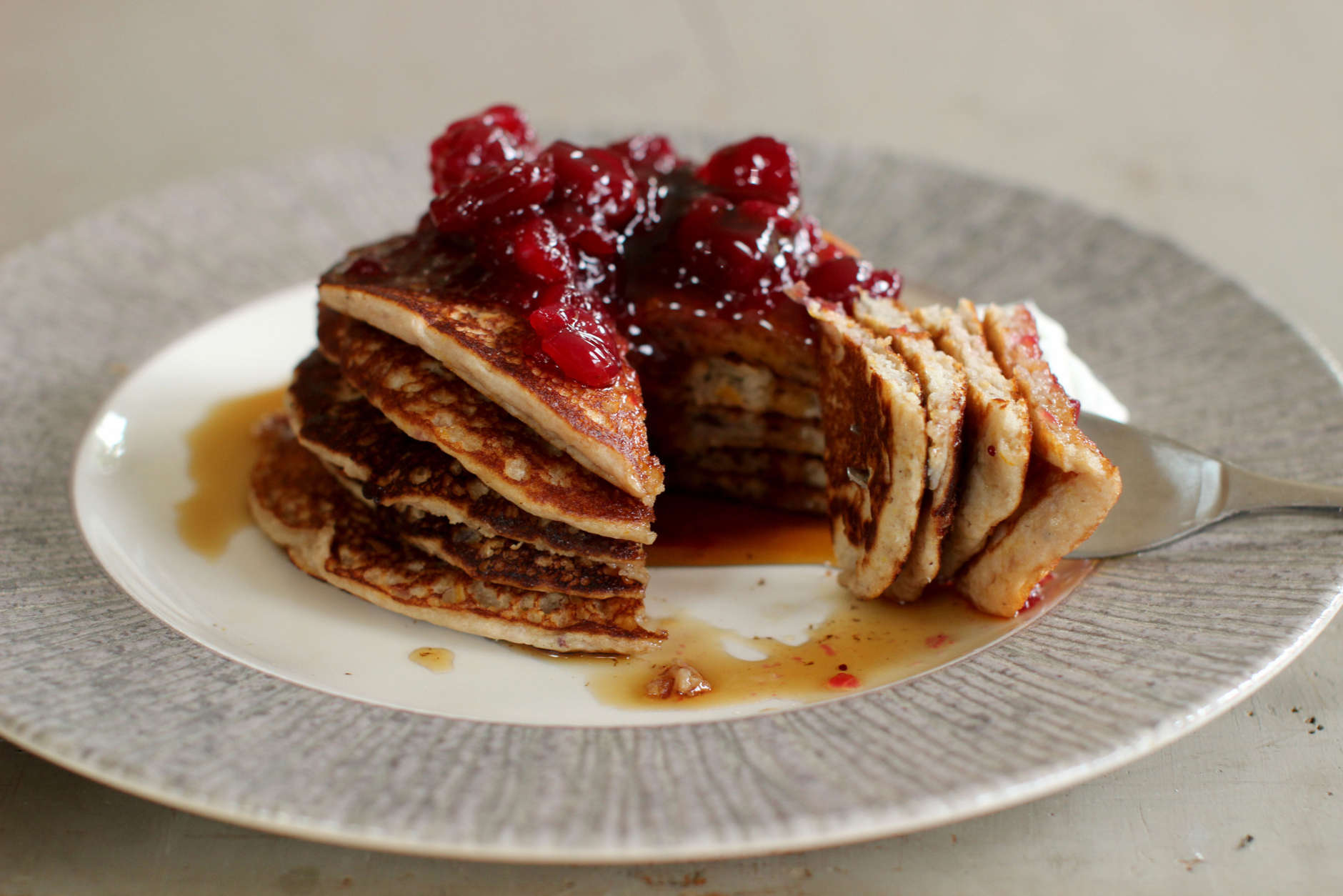 This Oct. 5, 2015 photo shows cranberry sauce, oat and flax pancakes in Concord, N.H. Making your own cranberry sauce this holiday is incredibly easy and it allows you to cut the sugar content in half without anyone missing it.  (AP Photo/Matthew Mead)