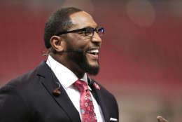 Television broadcaster and former Baltimore Raven Ray Lewis works before an NFL football game between the St. Louis Rams and the San Francisco 49ers Monday, Oct. 13, 2014, in St Louis. (AP Photo/Billy Hurst)