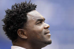 Formwr Indianapolis Colts running back Edgerrin James looks to the stands before the start of an NFL football game ibetween the Indianapolis Colts and the Jacksonville Jaguars n Indianapolis, Sunday, Sept. 23, 2012. James will be inducted into the Colts' Ring of Honor at halftime.  (AP Photo/AJ Mast)