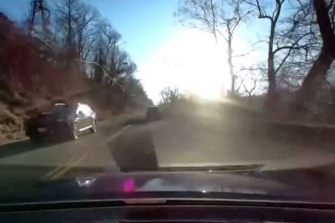 Driver commutes backward, reversing down busy Canal Road (Video)